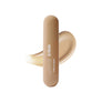 POV Beauty Amp It hydrating lip ampoule in Vanilla Latte — pale beige shade, product shot on a warm grey background
